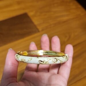 Elegant Gold and Cream Floral Bangle